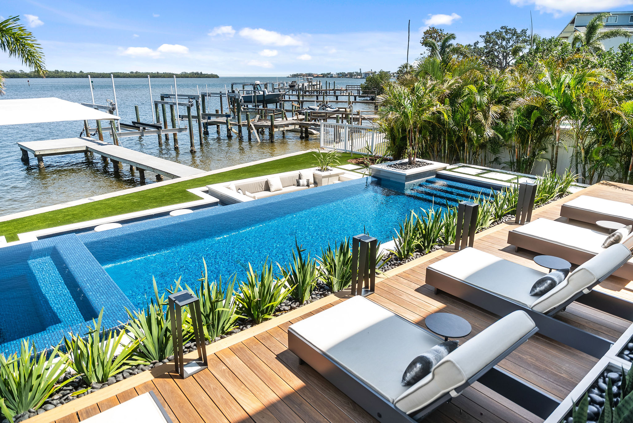 Luxury Lounge Seating Overlooking the Pool And Tampa Bay in Shoreline Outdoor Space Design by Solana Outdoor Living
