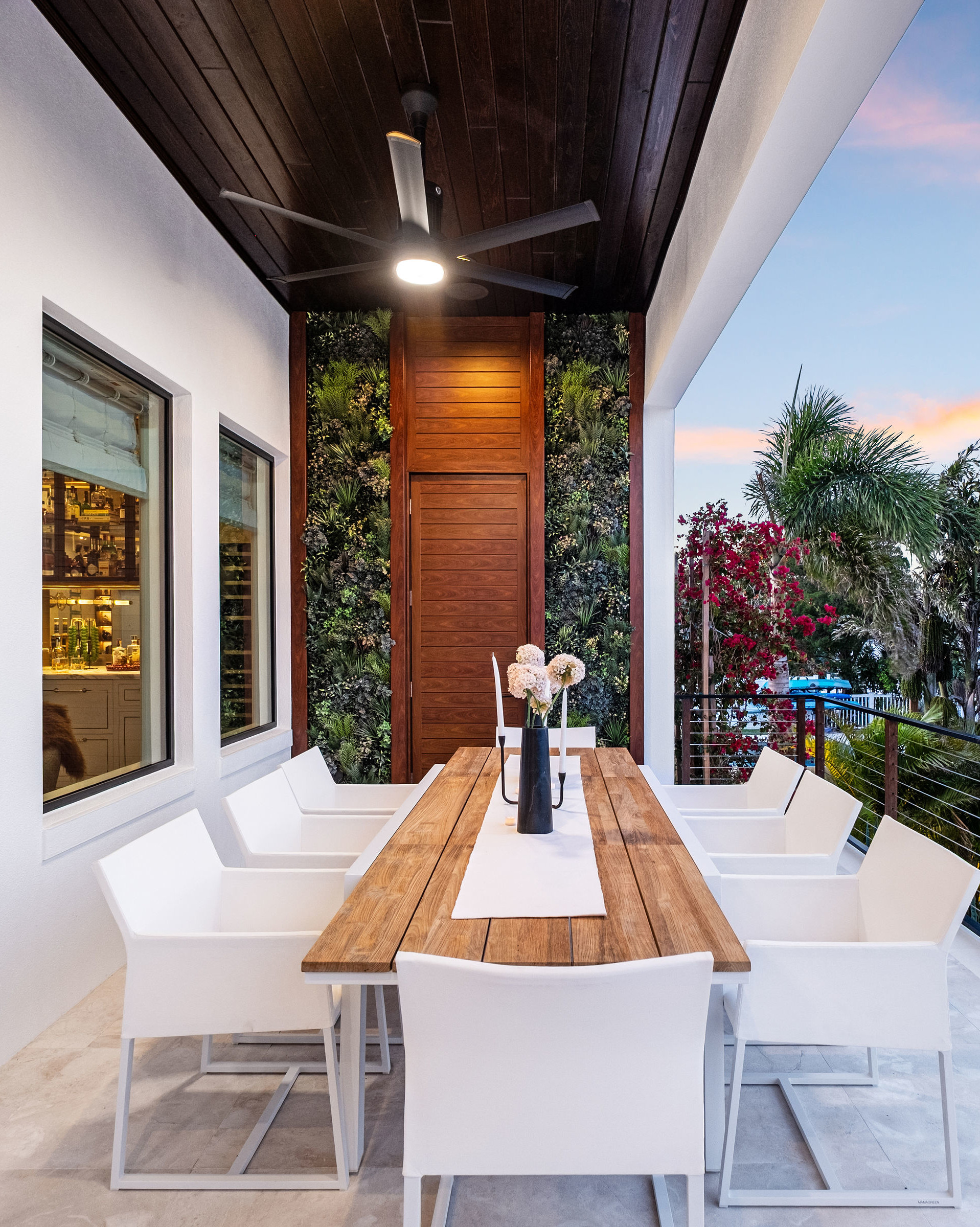 Outdoor dining set featuring Vistafolia greenery